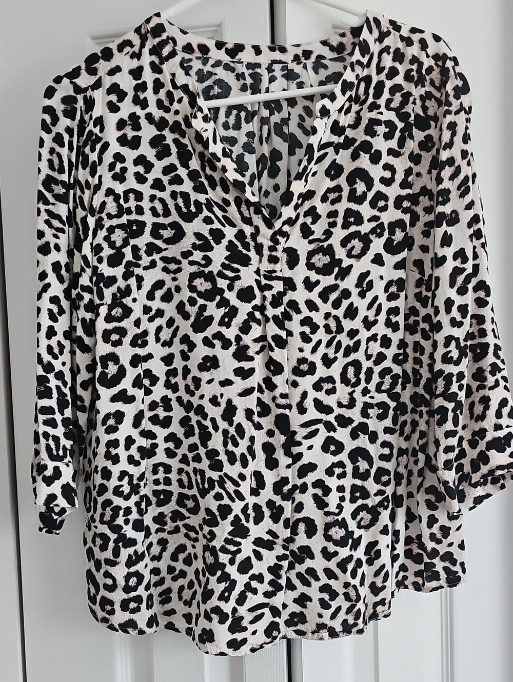 Women's Black and Cream Leopard Print Rayon Blouse.